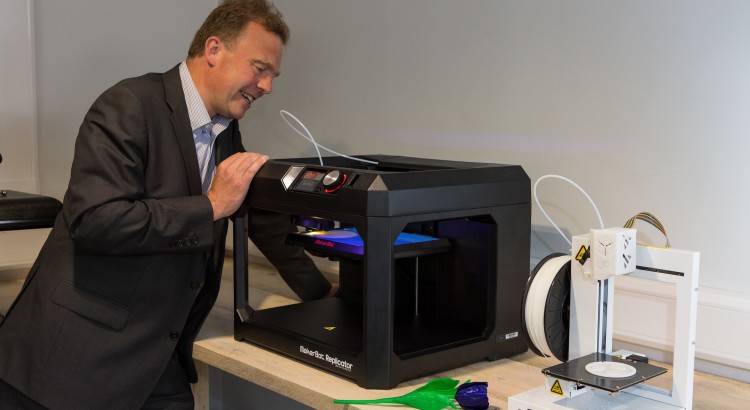 Man with 3D printer