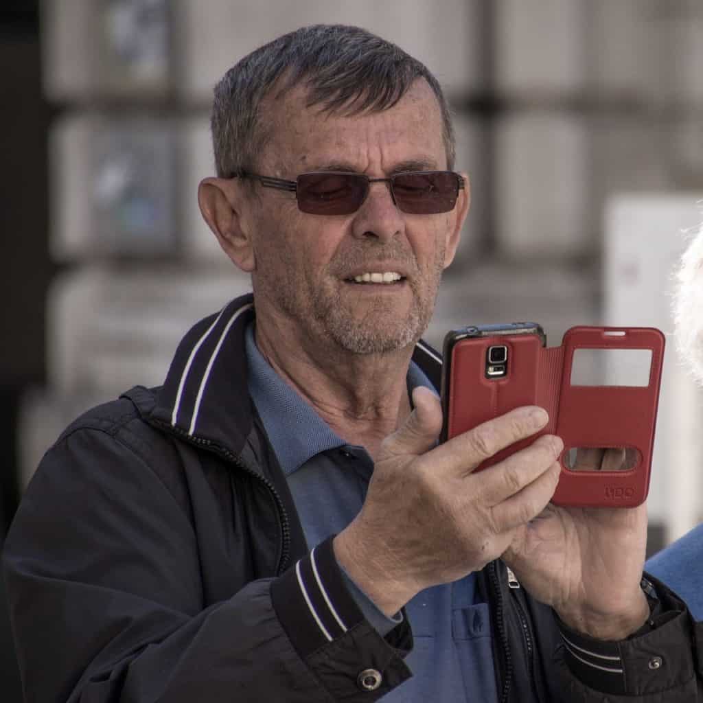 Elderly man on smartphone